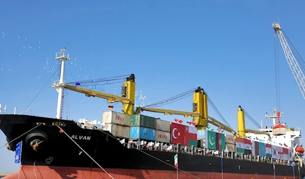 A cargo ship is docked during the inauguration ceremony of the newly built extension in the port of Chabahar on the Gulf of Oman, southeastern Iran, near the Pakistani border, Sunday December 3,2017. (AP)