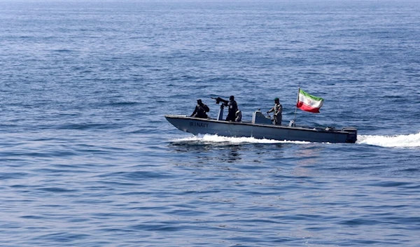 In this photo released Feb. 17, 2021, an Iranian naval vessel flying an Iranian flag participates in a joint naval exercise of the Russian Navy, the Iranian navy and the Iranian Revolutionary Guard's navy in the Indian Ocean. (Iranian Army via AP)