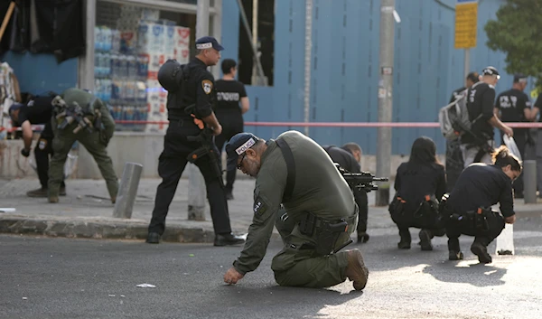 Israeli police investigate the scene of a deadly explosion in Tel Aviv, Friday, July 19, 2024. (AP)