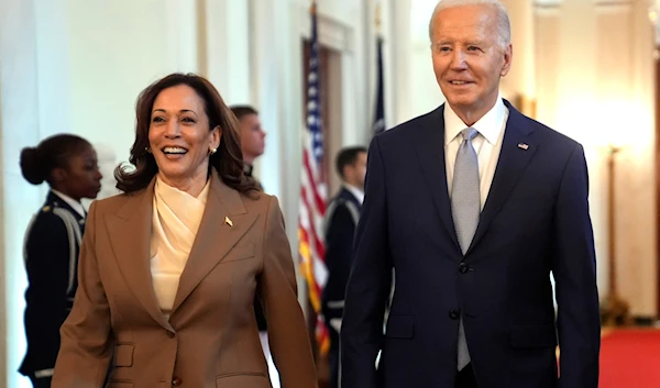 Vice President Kamala Harris, left, and President Joe Biden arrive for an event in the East Room of the White House, May 9, 2024, in Washington. (AP)