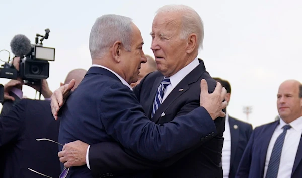 US President Joe Biden is greeted by Israeli occupation Prime Minister Benjamin Netanyahu after arriving at Ben Gurion International Airport, Oct. 18, 2023, in Tel Aviv, 'Israel'. (AP)