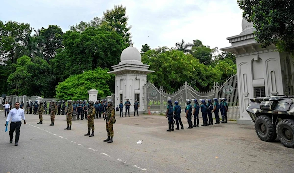 Bangladeshi soldiers stand guard at the Supreme Court of Bangladesh, amid the anti-quota protests in Dhaka on July 21, 2024. (AFP)