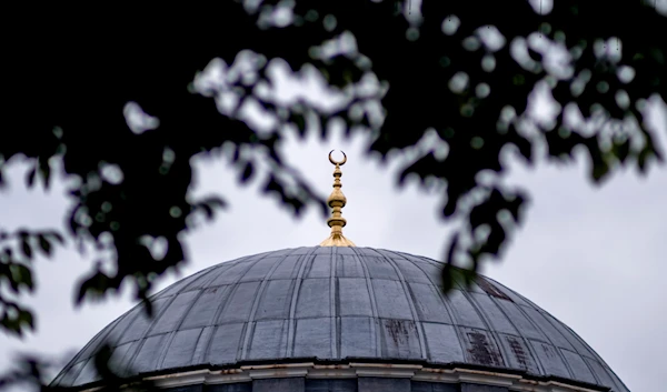 A crescent moon marks the top of the roof dome of the Sehitlik Mosque in Berlin, Germany, Thursday, June 29, 2023. (AP)