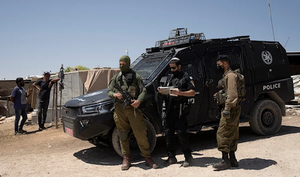 Israeli occupation forces in the occupied West Bank village of Umm al-Khair, occupied Palestine, July 10, 2024 (AP)