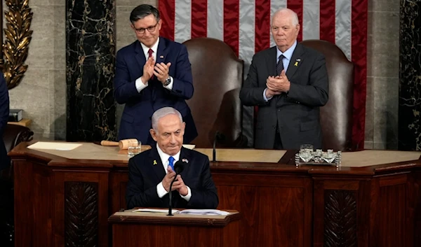 Israeli Prime Minister Benjamin Netanyahu speaks to a joint meeting of Congress at the Capitol in Washington, Wednesday, July 24, 2024, as House Speaker Mike Johnson of La., and Senate Foreign Relations Chair Ben Cardin, D-Md., listen. (AP)