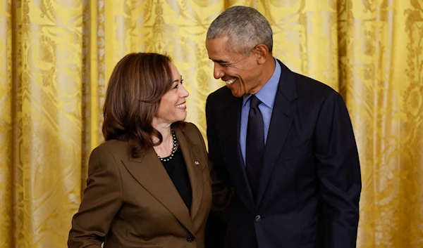 Former President Barack Obama and Vice President Kamala Harris during an event at the White House, April 5, 2022. (AFP)