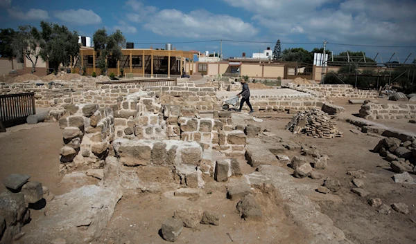 In this July 14, 2019 photo, Palestinians work on a 4th century AD St. Hilarion monastery archaeological site in central Gaza Strip. (AP)