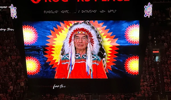 A First Nations land recognition video narrated by Chief Willie Littlechild plays on video screens prior to Game 3 of the Stanley Cup Final on Thursday, June 13, 2024, in Edmonton, Alberta. (AP)