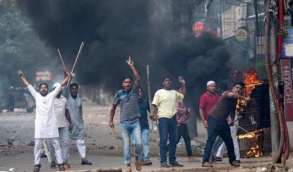 Students clash with police during a protest over the allocation of government jobs, in Dhaka, Bangladesh, July 19, 2024. (AP)