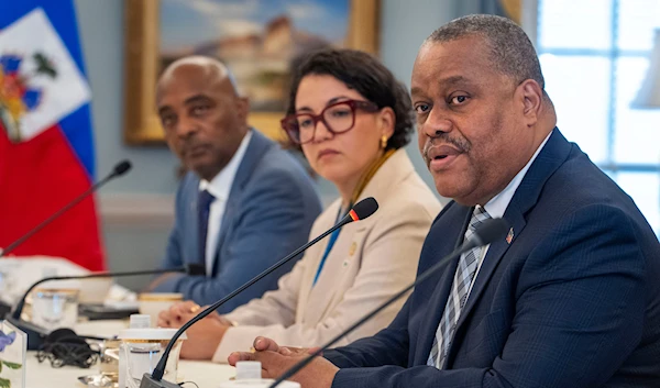 Haiti's Prime Minister Garry Conille, right, sits next to Foreign Minister Dominique Dupuy, meets with Secretary of State Antony Blinken, Tuesday, July 2, 2024, in Washington. (AP)