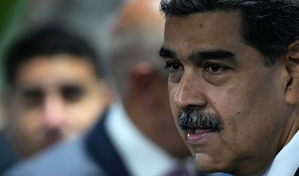 Venezuelan President Nicolas Maduro attends a signing of an agreement to respect the results of the upcoming presidential elections, at the National Electoral Council headquarters in Caracas, Venezuela, June 20, 2024 (AP)