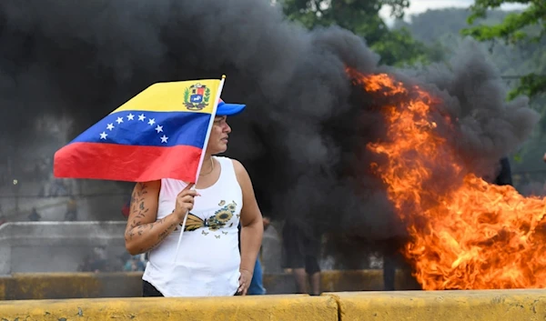 Protesters demonstrate against the official election results declaring President Nicolas Maduro's reelection, the day after the vote in Valencia, Venezuela, Monday, July 29, 2024. (AP)