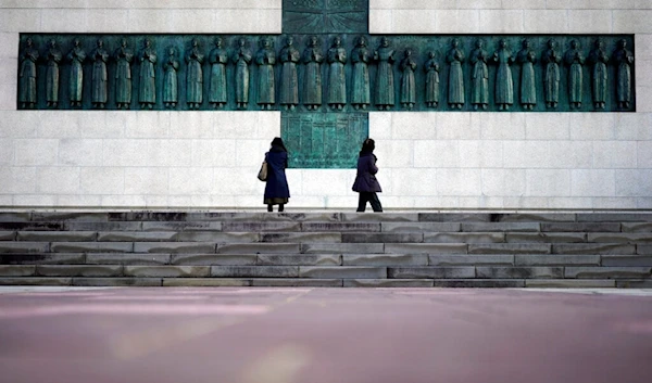 In this Nov. 17, 2019, file photo, people visit the Twenty-Six Martyrs Monument in Nagasaki, southern Japan. (AP)