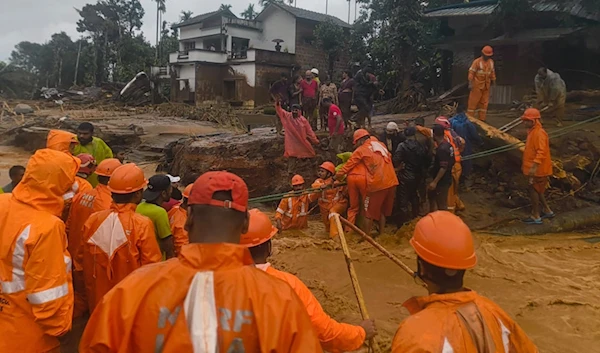 Emergency personnel work at the disaster site as they rescue landslide victims in Wayanad, Kerala, July 30, 2024. (AFP)