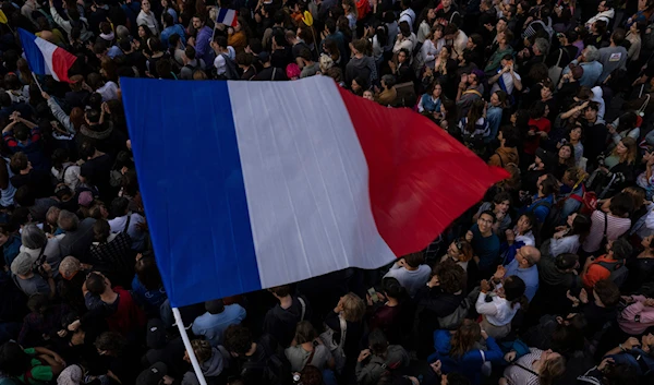 People gather at Republique plaza in a protest against the far-right, Wednesday, July 3, 2024, in Paris. (AP)