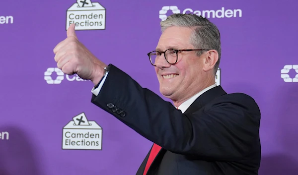 Britain's Labour Party leader Keir Starmer gives a thumbs up to his supporters after he was elected for the Holborn and St Pancras constituency, in London, on July 5, 2024. (AP)