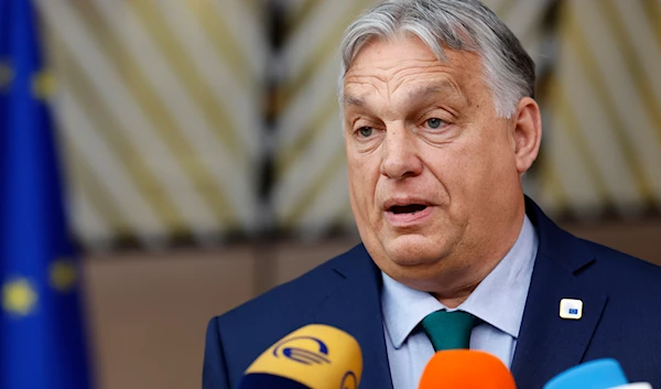 Hungary's Prime Minister Viktor Orban speaks with the media as he arrives for an EU summit in Brussels, Thursday, June 27, 2024. (AP)