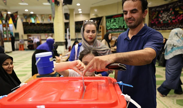 Higher voter turnout expected in Iran, presidential race remains tight