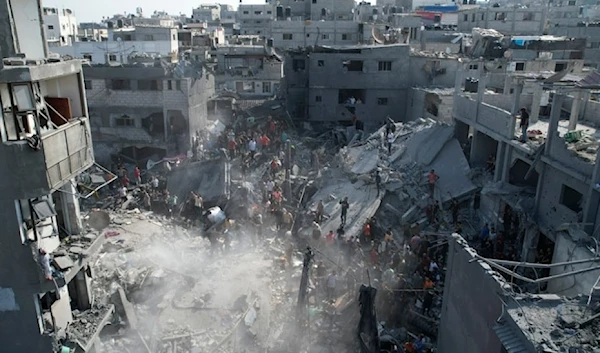 Palestinians look for survivors following a massacre caused by the Israeli bombardment of the Maghazi refugee camp in the Gaza Strip, occupied Palestine, November 5,2023. (AP)