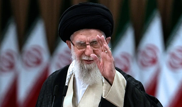 Iranian Supreme Leader Ayatollah Ali Khamenei waves after casting his vote for the presidential runoff election in Tehran, Iran, on July 5, 2024. (AP)