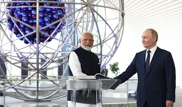 Indian Prime Minister Narendra Modi, left, and Russian President Vladimir Putin visit Atom pavilion at the Exhibition of Achievements of National Economy in Moscow, Russia, July 9, 2024. (AP)