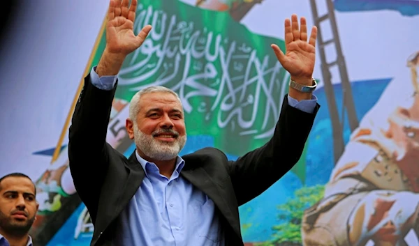 In this Dec. 12, 2014 file photo, Palestinian top Hamas leader Ismail Haniyeh greets supporters during a rally to commemorate the 27th anniversary of Hamas, in the northern Gaza Strip. (AP)