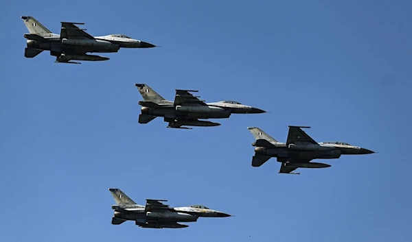 Hellenic Air Force F-16 fighter jets fly during a military parade to mark National "Oxi" (No) Day in Thessaloniki, Greece on October 28, 2023. (AFP)