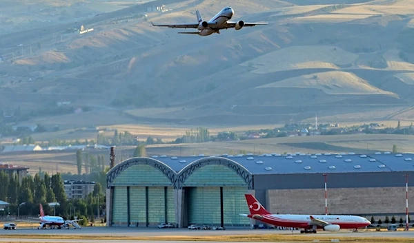 A Russian Plane, believed to be carrying released Russian prisoners, leaves the Ankara Airport, Turkey, Thursday, Aug. 1, 2024. (AP Photo)