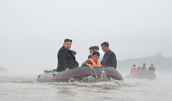 DPRK leader Kim Jong Un and Premier Kim Tok Hun visit a flood-affected area near the border with China, in North Pyongan Province, North Korea, July 31, 2024. (KCNA)