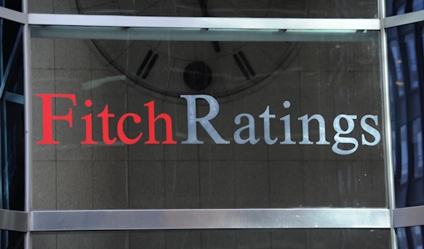 This photo shows signage for Fitch Ratings, Sunday, Oct. 9, 2011, in New York. (AP)