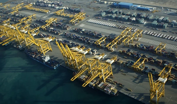 Container ships dock at the Dubai Port in the Jebel Ali Free Zone about 40 kilometers (25 miles) south of Dubai, United Arab Emirates Jan. 3, 2010. (AP Photo/Kamran Jebreili, File)