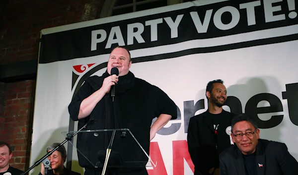 In this Monday, Aug. 4, 2014 photo, indicted Internet entrepreneur Kim Dotcom, center, speaks at a political rally, in Wellington, New Zealand. (AP)