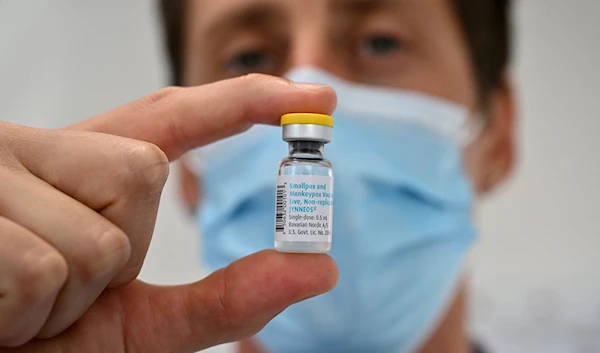 A doctor poses with a monkeypox vaccine vial at a Centre gratuit d'information, de dépistage et de diagnostic (CeGIDD) in Montpellier, southern France on August 23, 2024. (AFP)