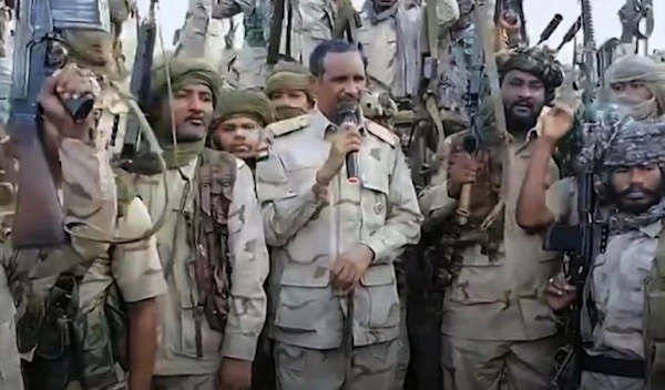 Commander Mohamed Hamdan Dagalo addresses Rapid Support Forces (RSF) fighters at an undisclosed location in July 2023 [Handout of video screen grab from Rapid Support Forces]