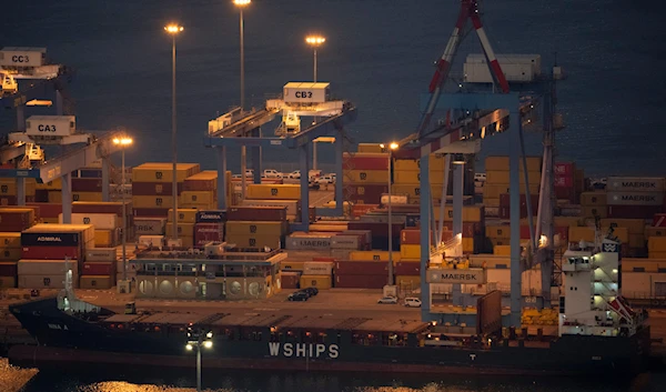 A cargo ship is seen docked at a containers terminal in the port of Haifa, Aug. 15, 2024. (AP)