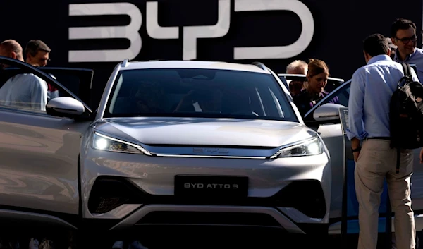 Visitors check the China made BYD ATTO 3 at the IAA motor show in Munich, Germany, on Sept. 8, 2023. (AP)