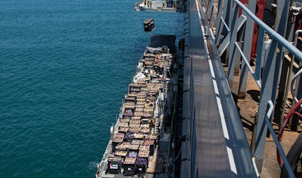 A picture released by CENTCOM shows aid being lifted onto a barge at the Israeli port of "Ashdod" (US Central Command (CENTCOM)/AFP)