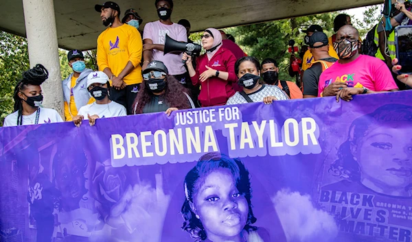 Linda Sarsour, center, speaks during the Good Trouble Tuesday march for Breonna Taylor on August 25, 2020, in Louisville, Ky. (AP)