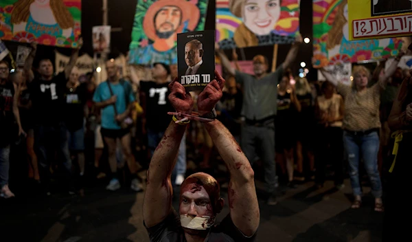 Thousands of Israelis join anti-govt rallies, call for captive deal