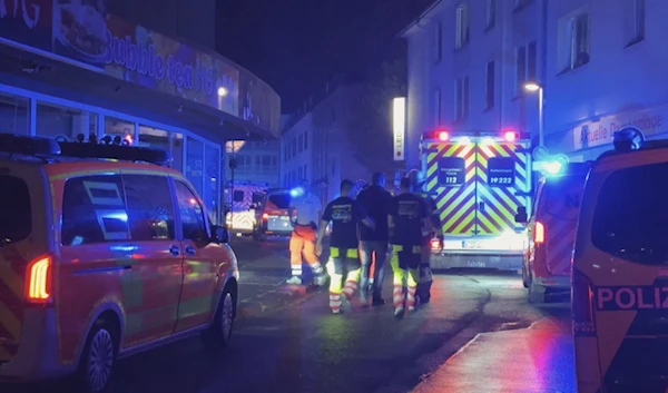 Police and ambulances stand near the scene where several people died and others were injured in an attack in Solingen, western Germany on August 23, 2024. (AFP)