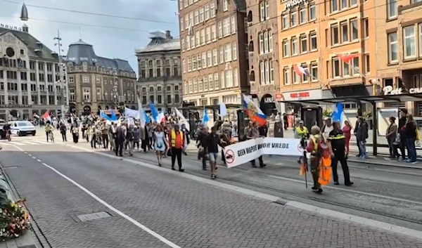 Demonstrators march in the streets of Amsterdam to protest armament to Ukraine, Amsterdam, The Netherlands, August 25, 2024. (@ivan_8848)