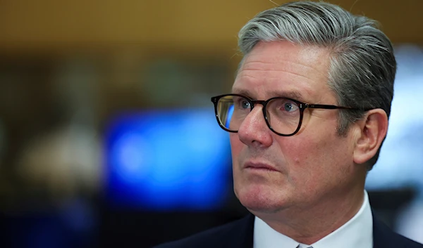 British Prime Minister Keir Starmer looks on at the Metropolitan Police Command and Control Special Operations Room at Lambeth Police Headquarters in London, Friday, August 9, 2024 (AP)