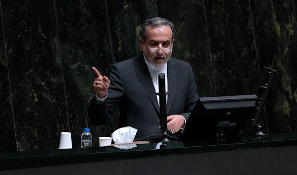 Foreign Minister Abbas Araghchi speaks in an open session of parliament during the second day of debate on the 19 proposed ministers by Iranian President Masoud Pezeshkian in Tehran, Iran, Aug. 18, 2024 (AP)