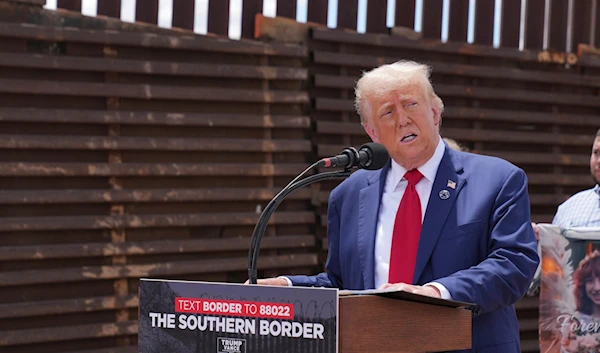 Former President Donald Trump speaks during a campaign event in front of the US-Mexico border, Thursday, August 22, 2024, in Sierra Vista, Arizona (AP)