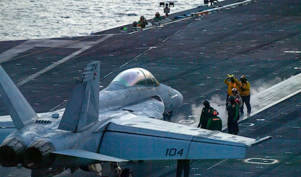 an F/A-18 Super Hornet prepares to launch off the flight deck of the Nimitz-class aircraft carrier USS Theodore Roosevelt July 5, 2024, in the South China Sea. (via AP)