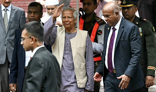 Nobel laureate and chief adviser of Bangladesh's new interim government, Muhammad Yunus greets the public after laying a wreath at the National Martyrs' Memorial, Dhaka, Bangladesh, August 9, 2024. (AFP)