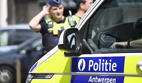 A file picture shows Belgian police officers stationed near the site of a terrorist incident at the Sint-Bernardsesteenweg in Hoboken, Antwerp. (AFP)