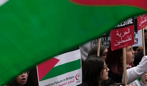 Students march during a pro-Palestinian demonstration in London, Saturday Oct 14,2023. (AP)