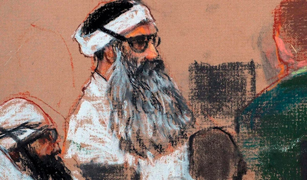 This Monday, Dec. 8, 2008 courtroom drawing by artist Janet Hamlin shows Khalid Sheikh Mohammed attending a pre-trial session at Guantanamo Bay Naval Base, Cuba. (AP)