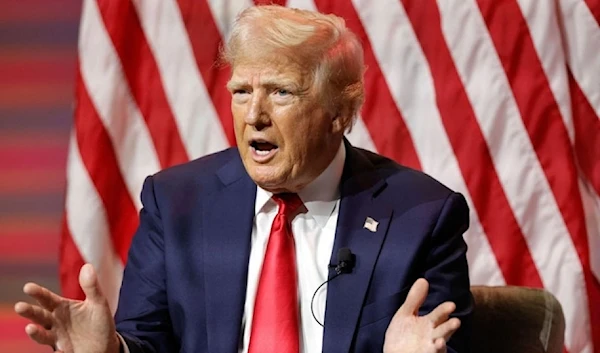 Former US President Donald Trump answers questions during the National Association of Black journalists’ annual convention in Chicago on July 31, 202. (AFP)